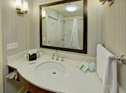 Guest Room Bathroom with Vanity and Amenities 