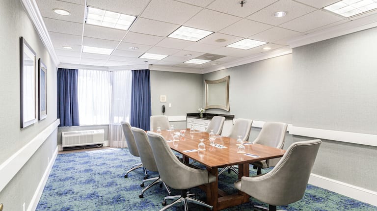 Boardroom with long table and chairs