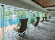 View of Chairs looking on to Pool