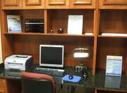 Business Center With Computer Workstations, Chair, Wall Art, and Printer