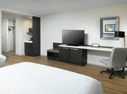 Queen Double Deluxe Guestroom with Two Beds, Kitchenette, Work Desk, and Room Technology
