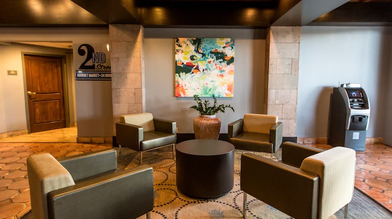 Comfortable seating and ATM in the lobby