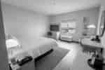Bed and TV in guestroom