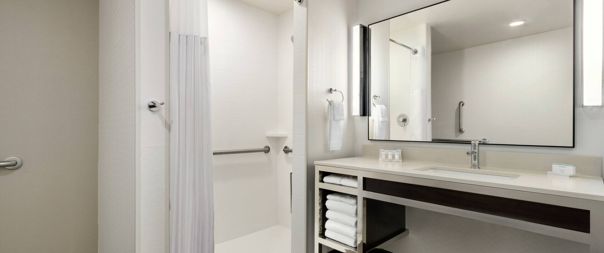 Bathroom with Roll In Shower and Accessible Vanity