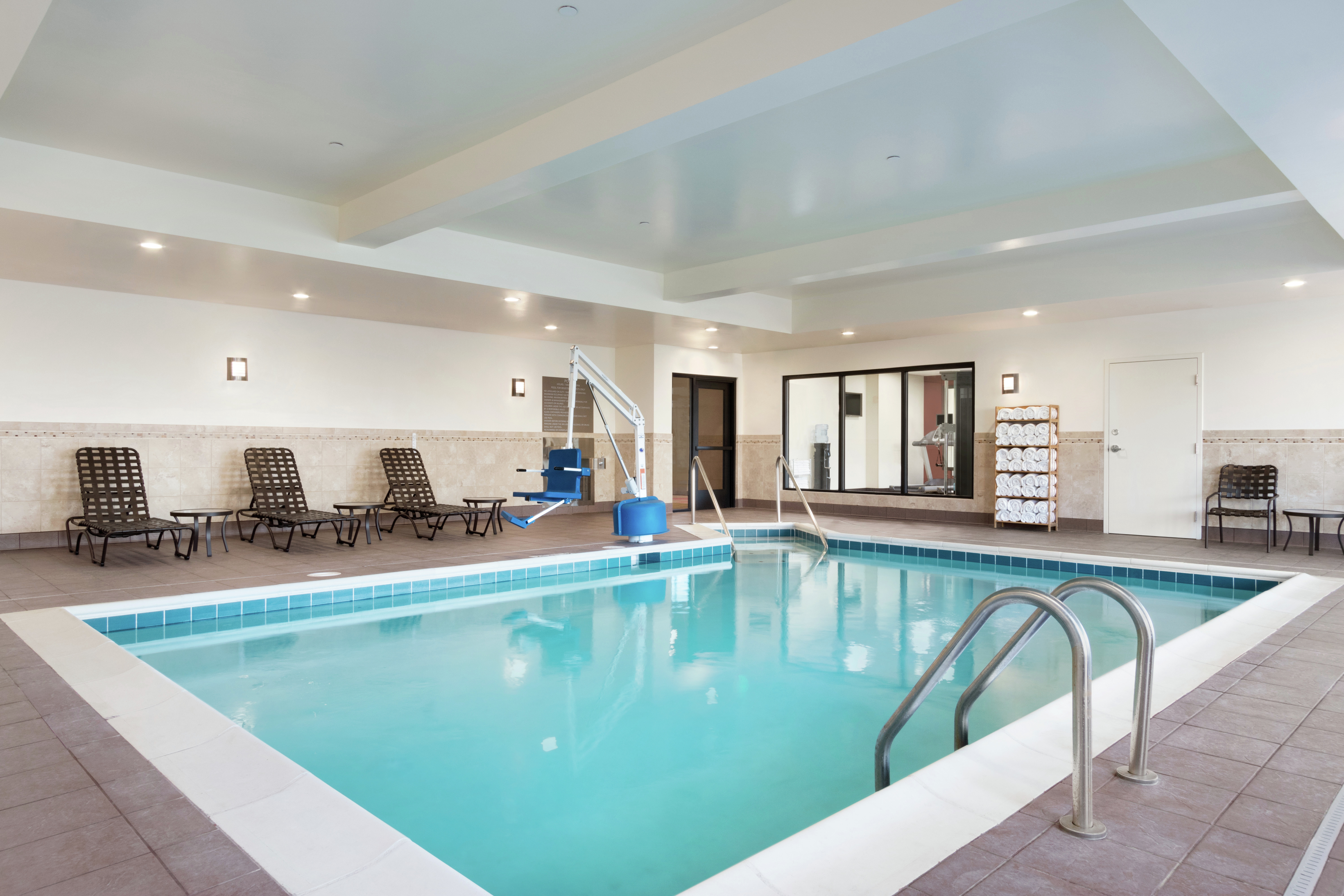 Indoor Pool and Lounge Chairs