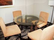 Presidential Suite with Glass Table and Four Chairs