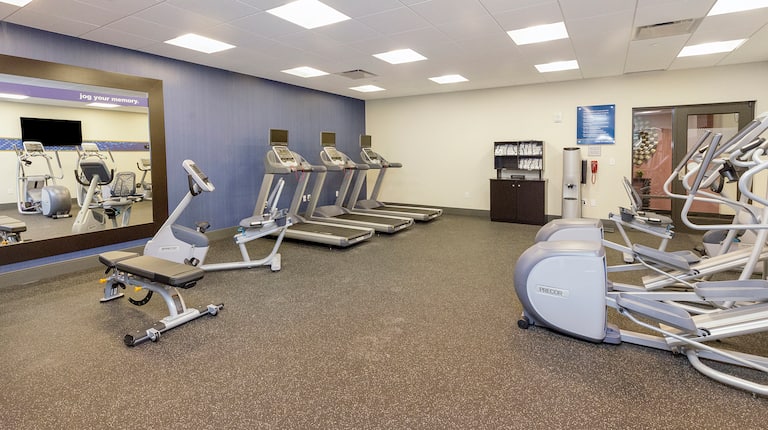 Fitness Center with Treadmills, Cycle Machine, Weight Bench and Cross-Trainers
