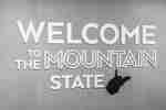 Welcome to the Mountain State Sign on a Wall