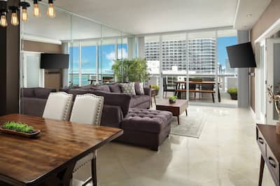 Open Concept living space with a fully equipped Kitchen, Dining, and Living Room