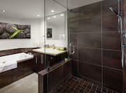 Master Bedroom bathroom with bathtub and standup shower
