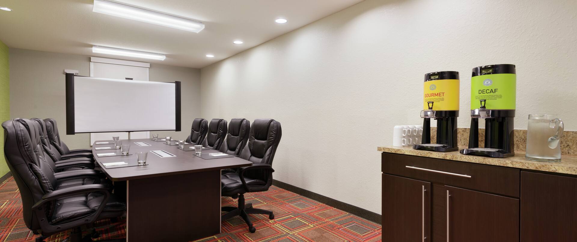 Conference Table, Chairs, and Hot Beverage Station in Meeting Room