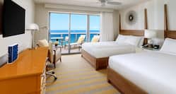 Two Queen-Sized Beds and Large Window View of Ocean