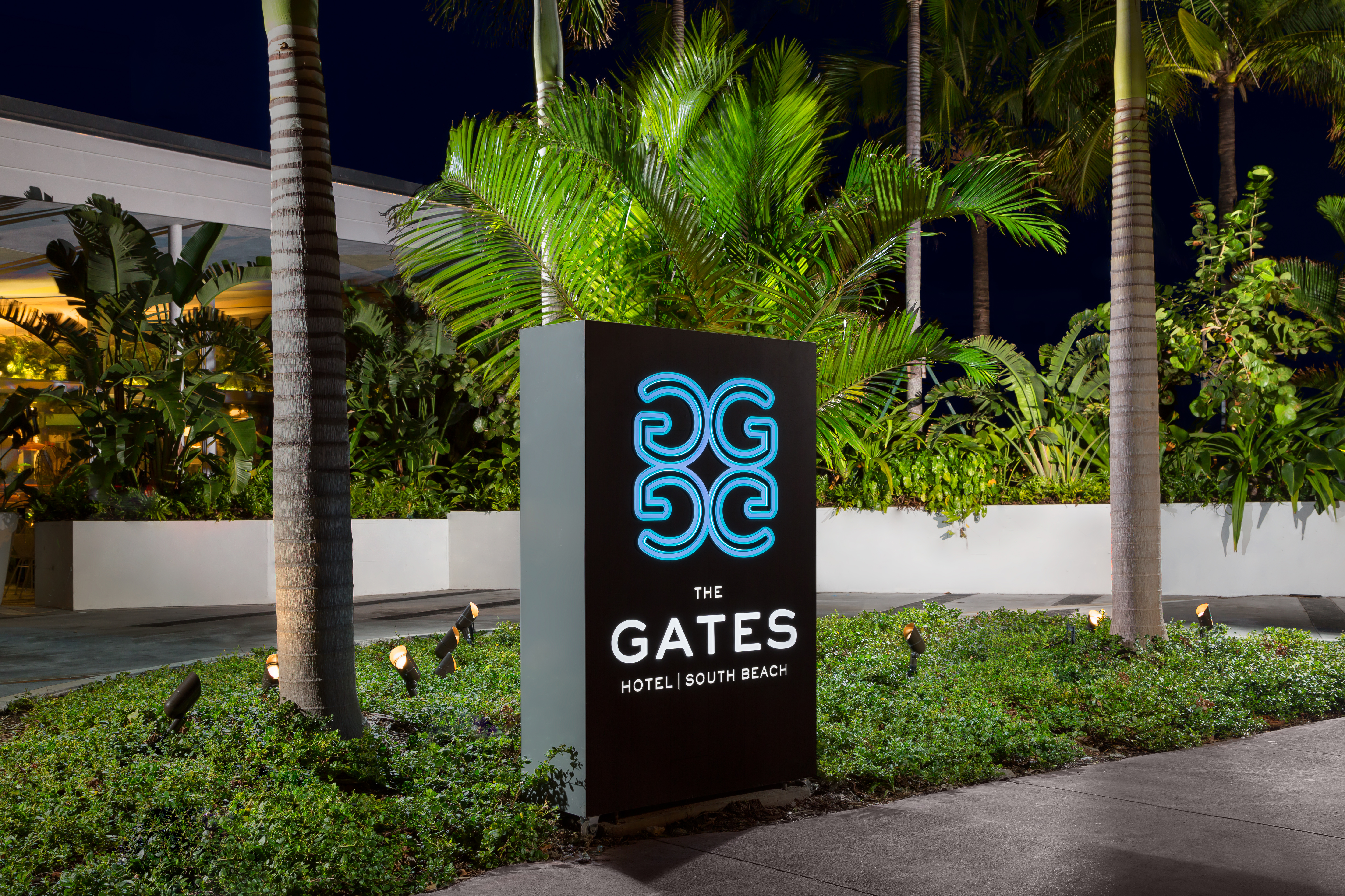 Hotel Exterior The Gates Sign at Night