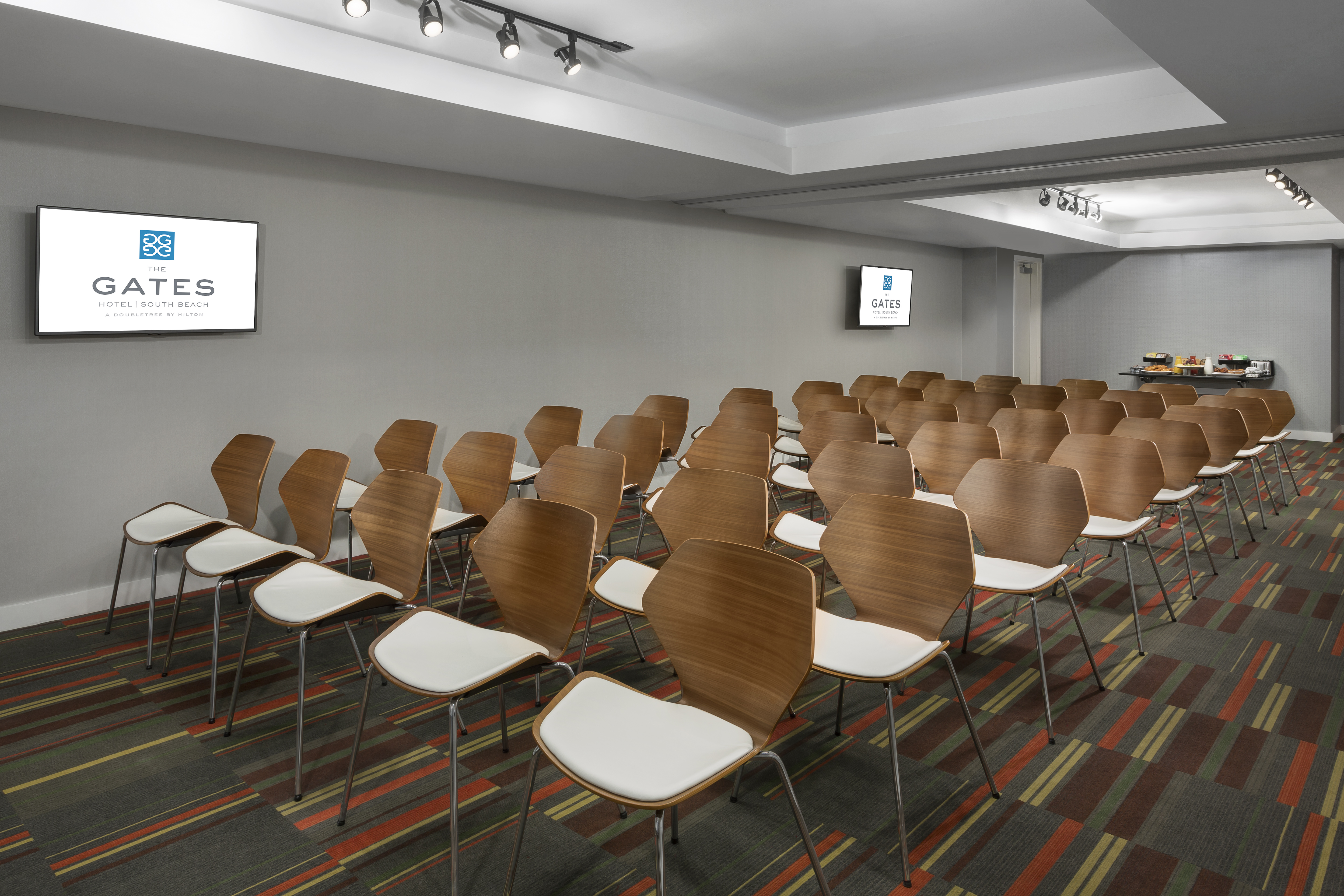 Meeting Room Theater Setup with Two Wall Mounted HDTV