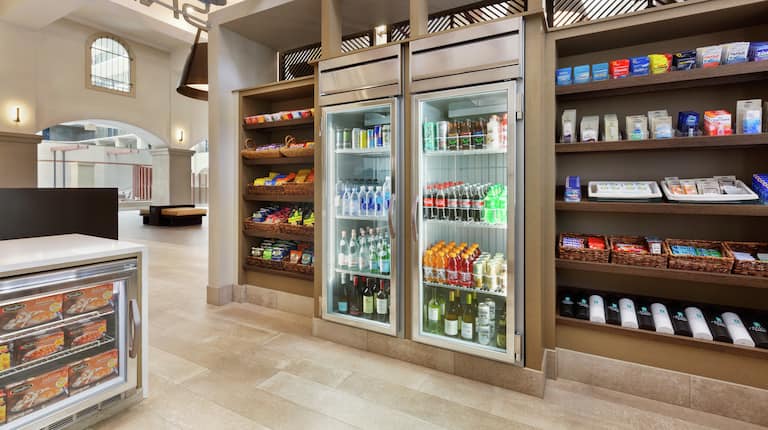 Convenient in lobby grab n go market fully stocked with toiletries, beverages, snacks, and frozen meals.