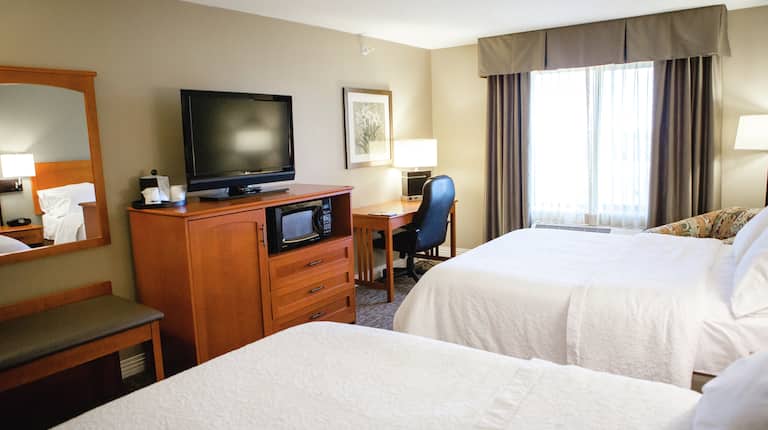 Standard Room with 2 Queen sized Beds Desk TV and Microwave