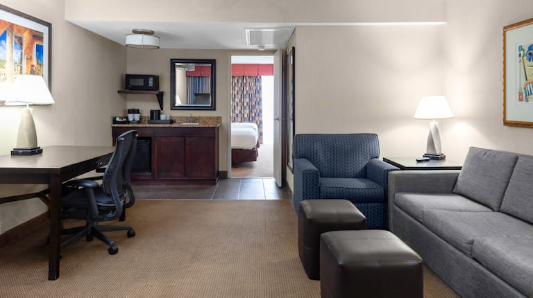 guest suite lounge area, sofa, chair, work desk, wet bar
