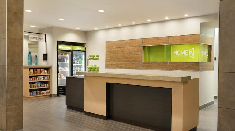 Front Desk and Home2 Market Snack Shop in Lobby