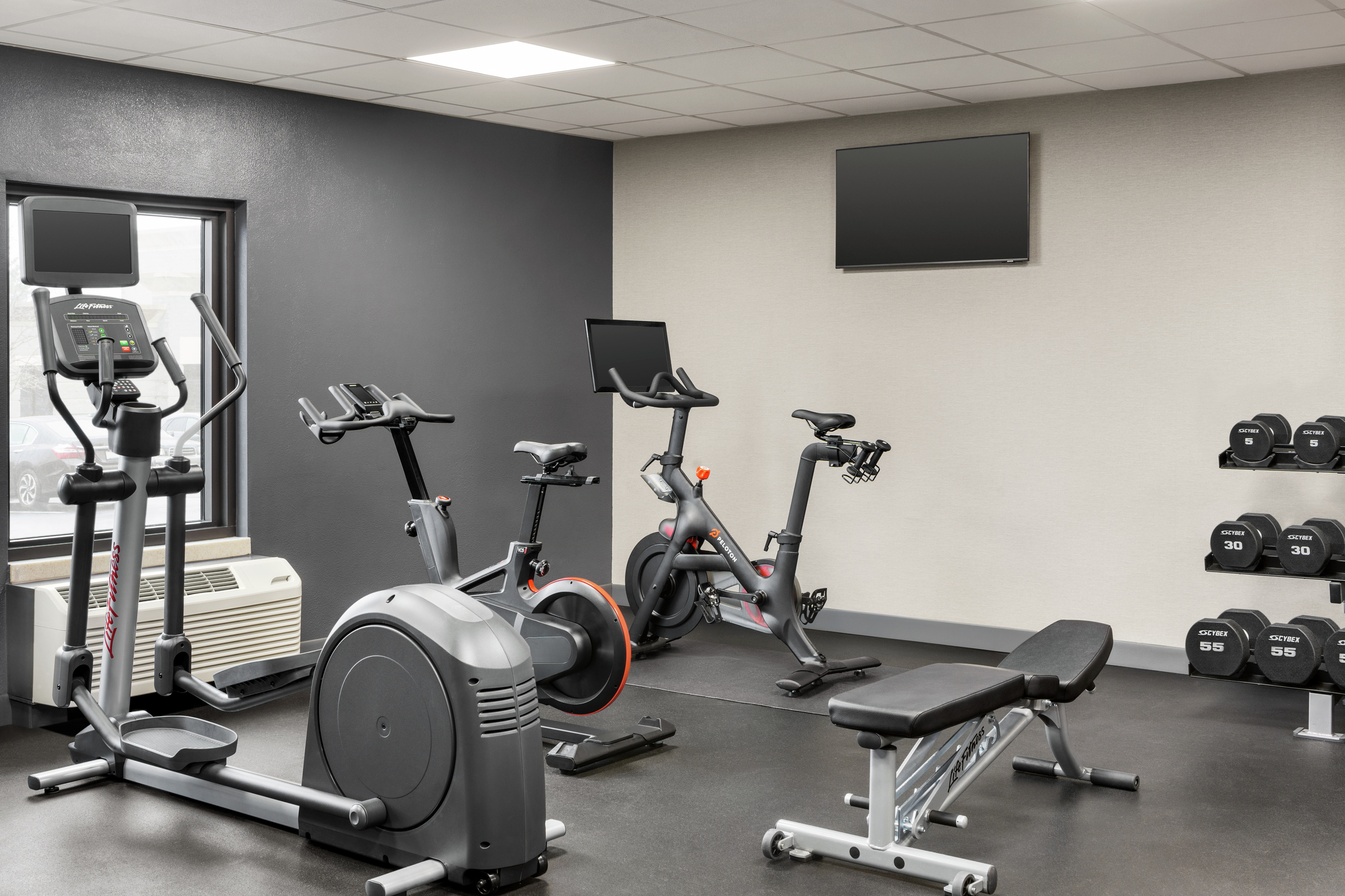 Convenient on-site fitness center featuring an array of exercise equipment options