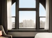 Guestroom with City View from Window