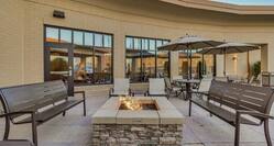 Outdoor Patio with Seating Around Fire Pit Table