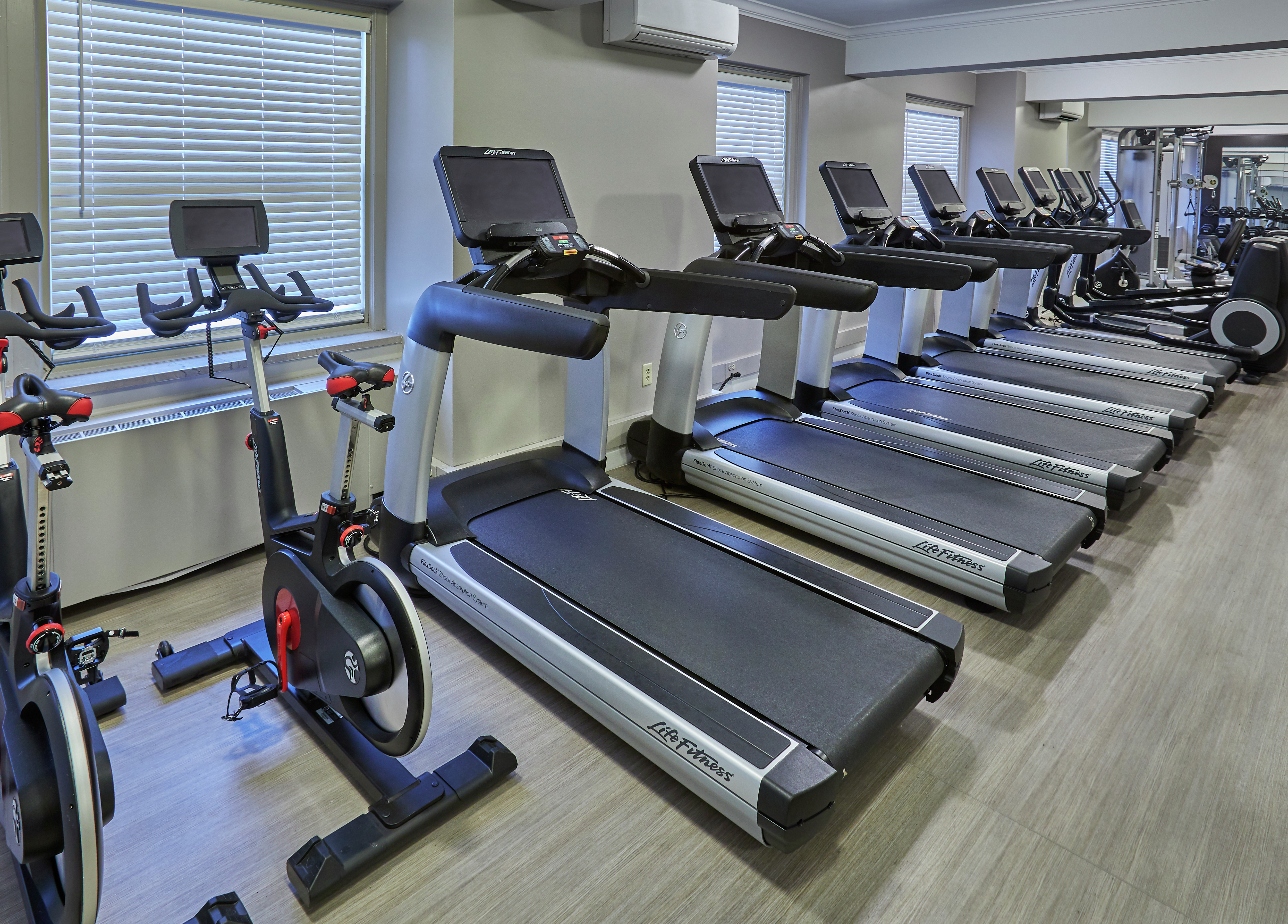 Fitness Center with Treadmills and Exercise Equipment