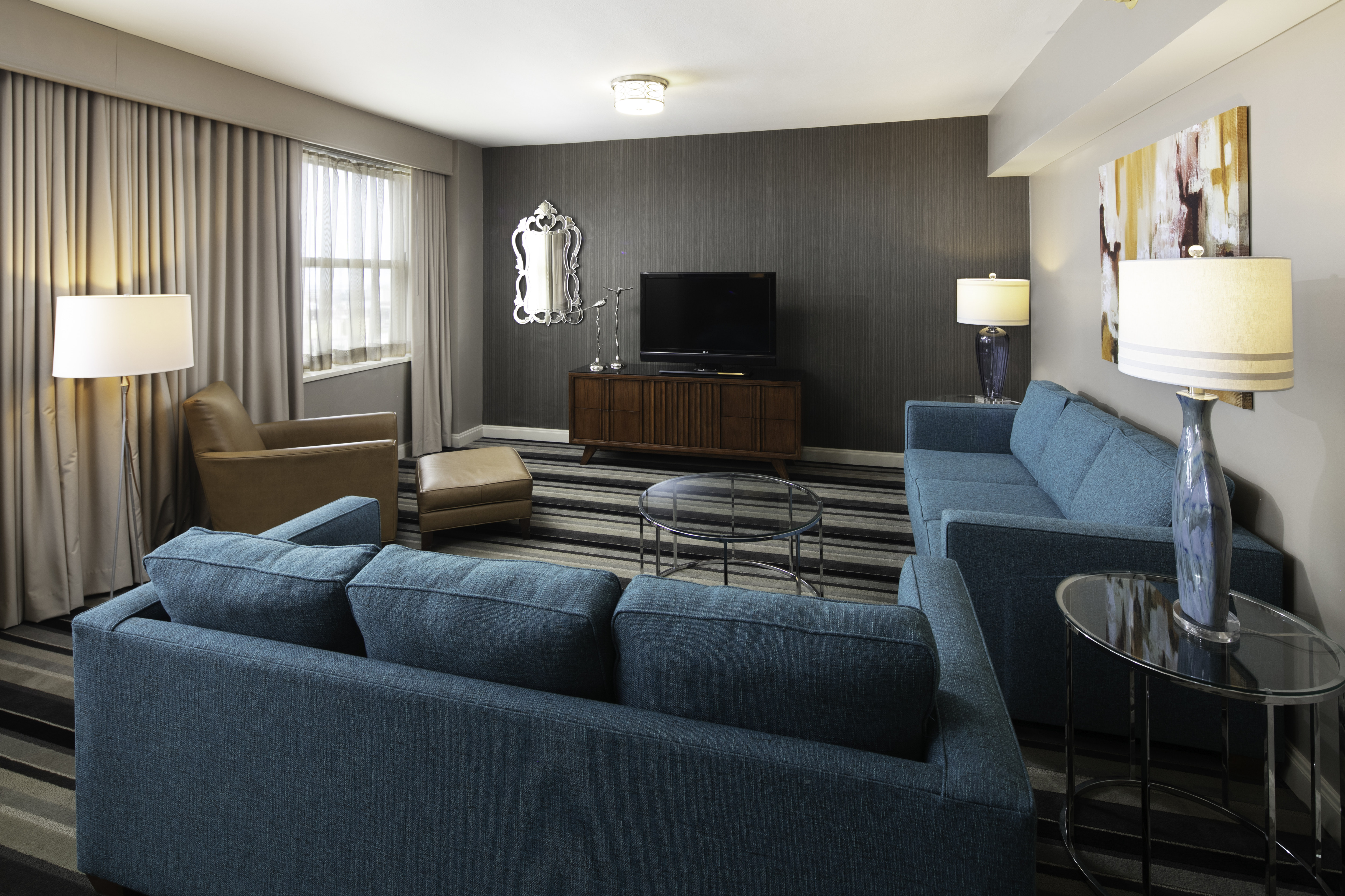 Royal Suite Living Area with TV and Sofa