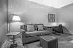 Lounge area with desk and couch