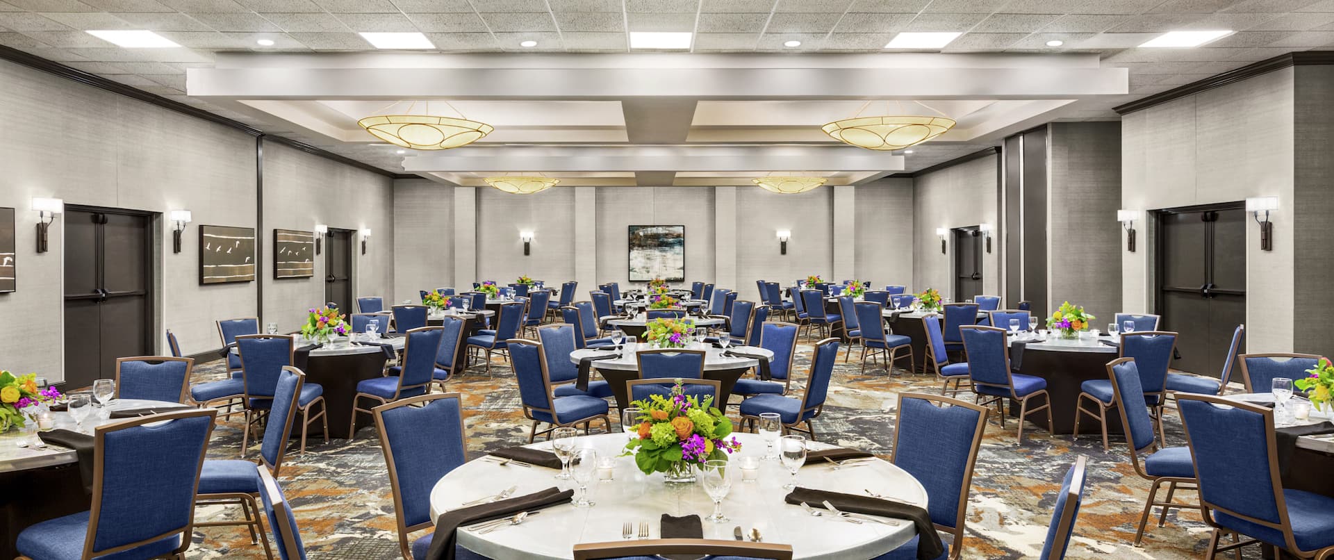 Spacious on-site meeting room featuring beautiful banquet setup.