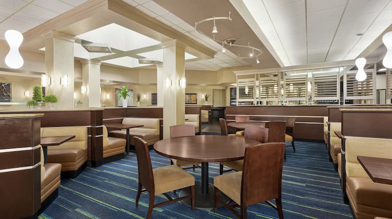 Spacious on-site restaurant with ample seating and welcoming atmosphere.