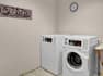 Guest Laundry Room with Coin-Operated Washing Machines