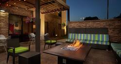 Patio with Seating and Firepit at Night