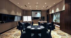 Meeting Room with Projector Screen, Round Tables and Chairs