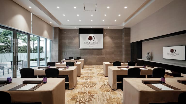 Meeting Room with Classroom Setup and Projector Screen