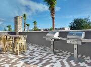 exterior patio with barbeques