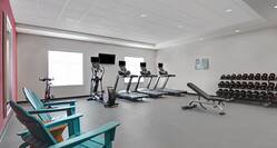 fitness center with weights and exercise machines