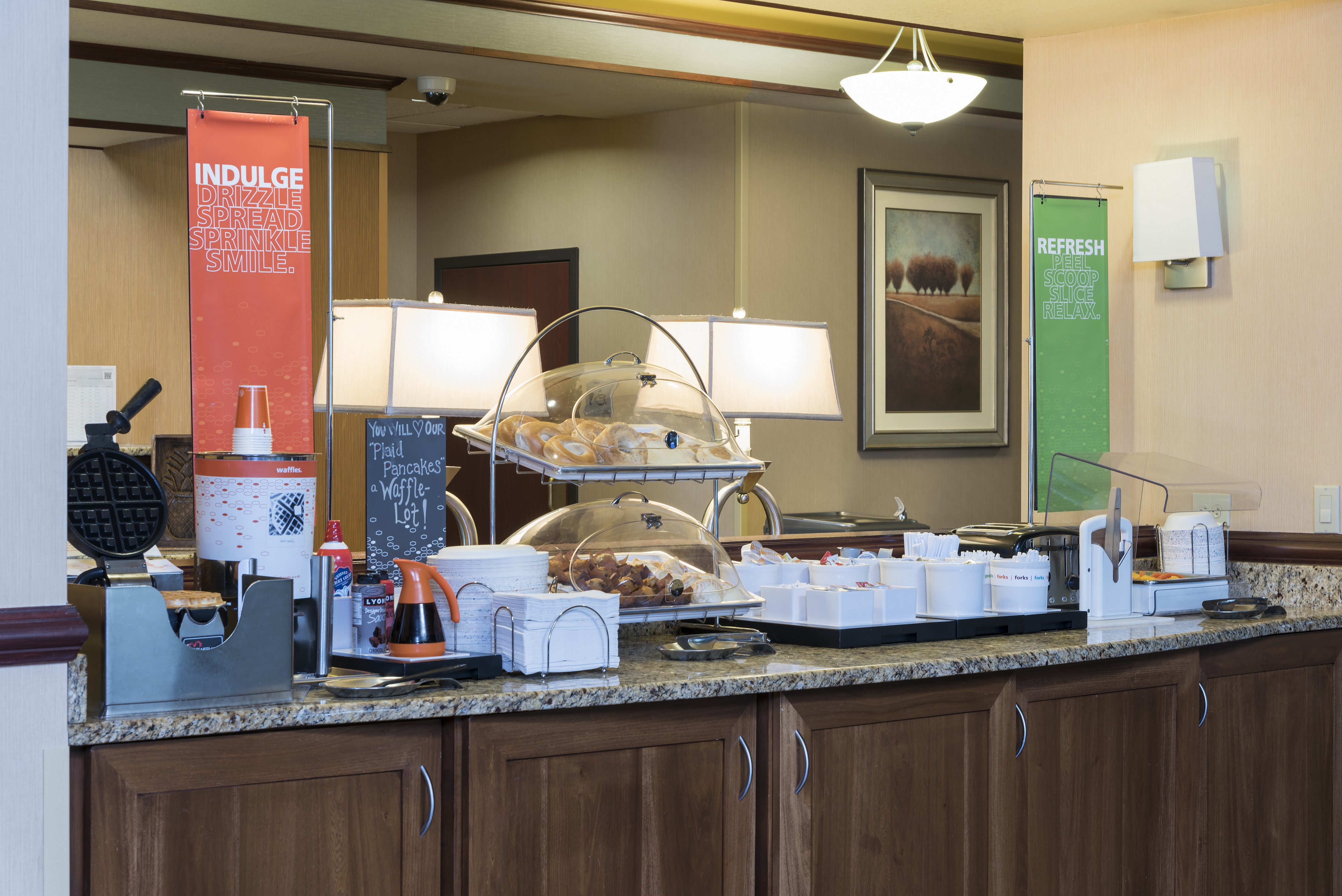 Breakfast Buffet Area Counter with Waffle Maker and Pastry Trays