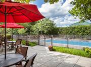 Hampton Inn Middletown Hotel, NY - Patio with Seating and View of Pool