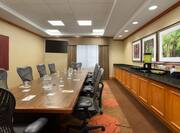 Boardroom with Large Meeting Table, Office Chairs and Coffee Station