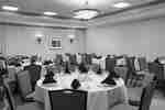 Ballroom Dining Area with Round Tables and Chairs