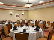 Ballroom Dining Area with Round Tables and Chairs