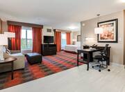 Accessible Guest Suite with Sofa, Footrest, HDTV, Work Desk and Bed