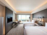 Deluxe Guestroom with Two Beds, Room Technology, Work Desk, Lounge Area, and Outside View