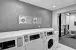 Guest Laundry Room with Washing Equipment