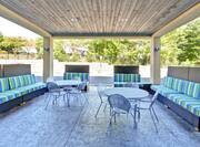 Outdoor Patio Area with Seats and Tables