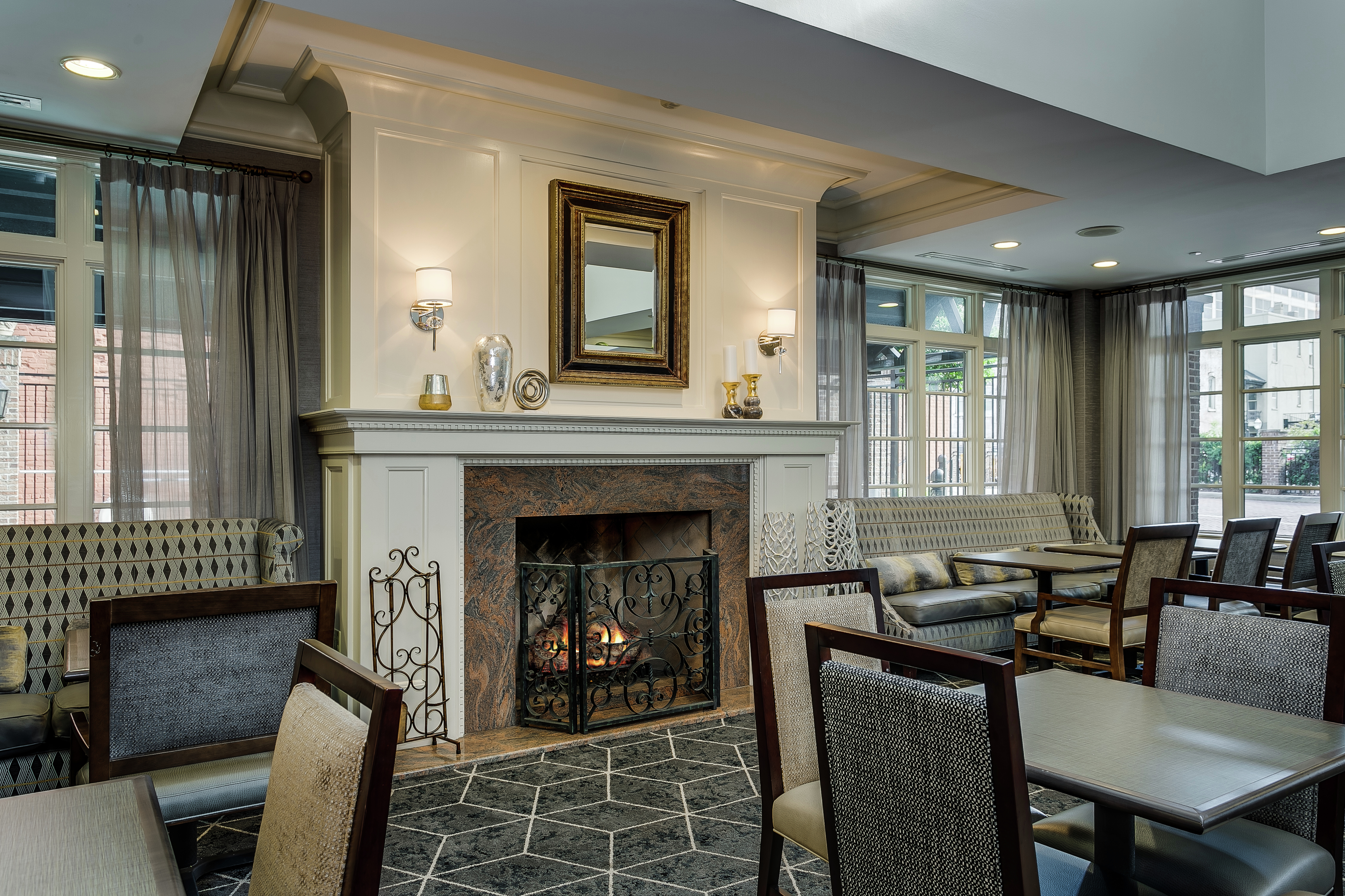 Hotel Lobby with Seating and a Fireplace