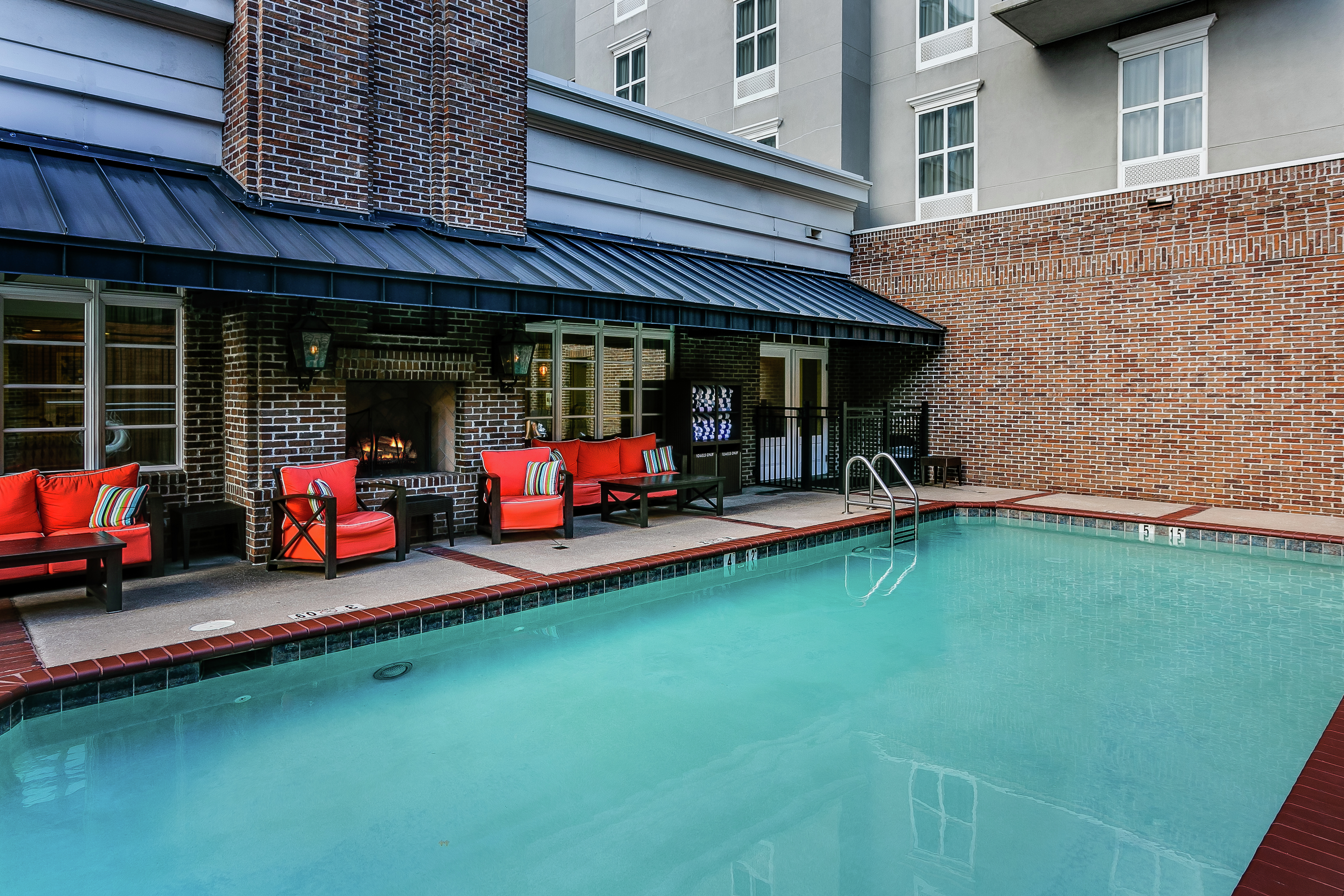 Outdoor Pool with Patio Seating