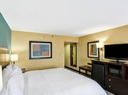 Guestroom with King Bed, Mini Fridge, Microwave and Television