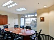 Boardroom with Conference Table and Outside View