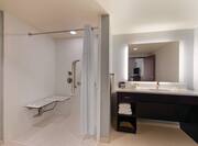 Accessible Bathroom with Roll-In Shower and Bench